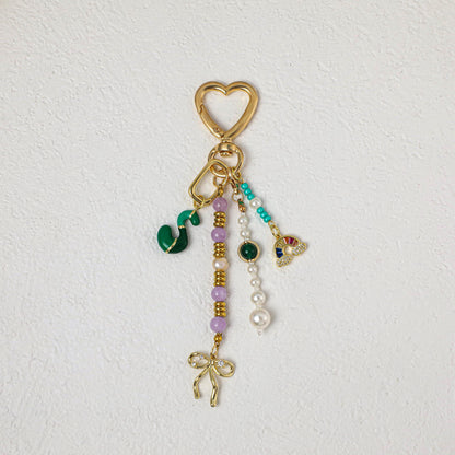 Personalized beaded keychains, letter pendant keychains, pearl keychains, bag charms, personalized keychains, car keychains, birthday gifts.